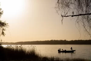 A park visitor casts a fishing line at Fairfield Lake State Park on Feb. 27. State lawmakers are close to approving up to $1 billion in new funding for state parks. Credit: Eddie Gaspar/The Texas Tribune